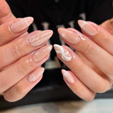 Nude manicure with snowy nail art