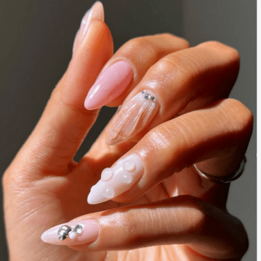 Sea-Impressed Nails for Your Darkish Siren Look