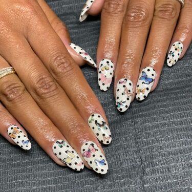 polka dot and butterfly nails