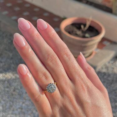 Short manicure with nude polish