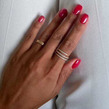 Short nails with bright red nail polish