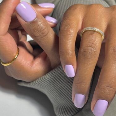 Gel manicure with lilac nail polish