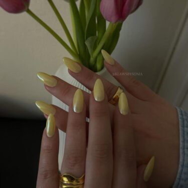 Almond nails with butter yellow polish