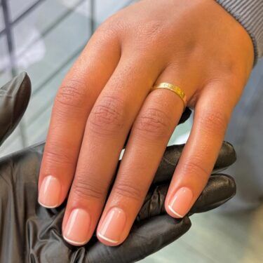 Short nails with a baby French manicure design