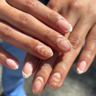 A manicure with textured design and French tips