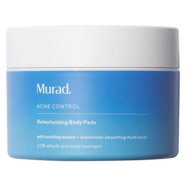 Murad Acne Control Retexturizing Body Pads in a blue jar with a white lid, salicylic acid exfoliating body pads designed to smooth rough skin and help clear body breakouts, featured in a roundup of the best body exfoliators.