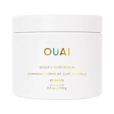 OUAI Scalp & Body Scrub in St. Barts in a white jar, an exfoliating sugar scrub for scalp and body featured in a roundup of the best body exfoliators.
