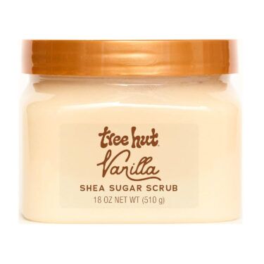 Tree Hut Vanilla Shea Sugar Scrub in a clear jar with a gold lid, a shea butter–infused sugar body exfoliator featured in a roundup of the best body exfoliators.