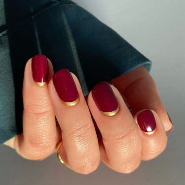 close-up of nails with reverse French manicure