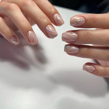 Nude coffin nails with glitter design