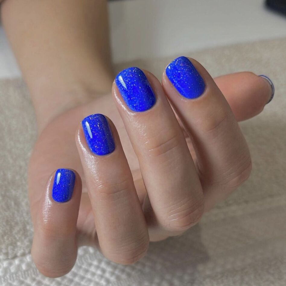 electric blue sparkle manicure