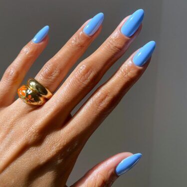 Long nails with bold blue polish