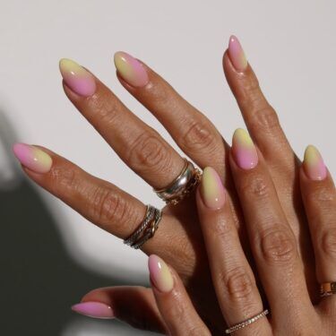 Manicure with pink and yellow nail polish