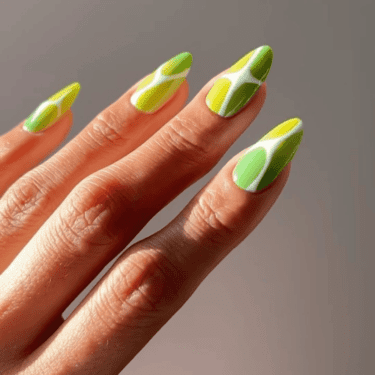 Long nails with lemon and lime polish and aura design