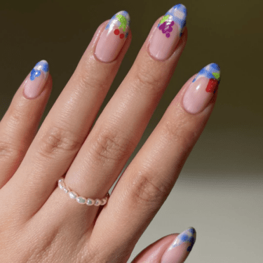 Long nails with picnic print and cherry nail art