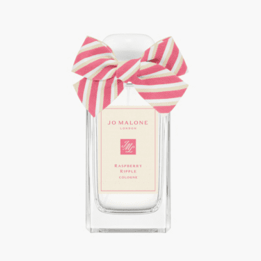Jo Malone London Raspberry Ripple Cologne with pink striped bow, featured in a roundup of the best berry perfumes.