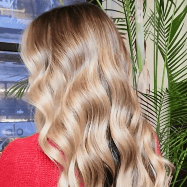 Almond blond hair with loose waves