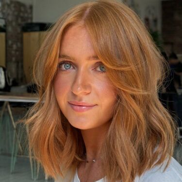 lob haircut with copper hair