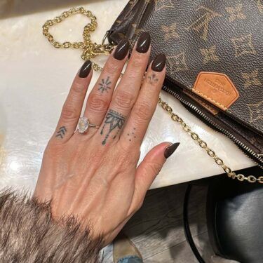 Manicure with dark brown, espresso polish