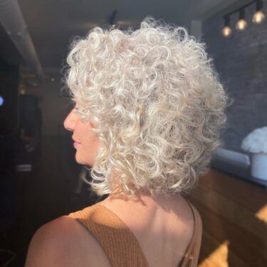 Ice blond curly bob