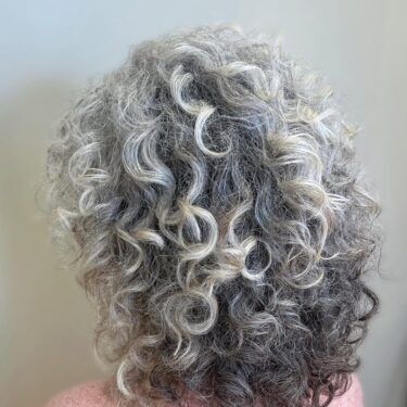 Curly gray haircut