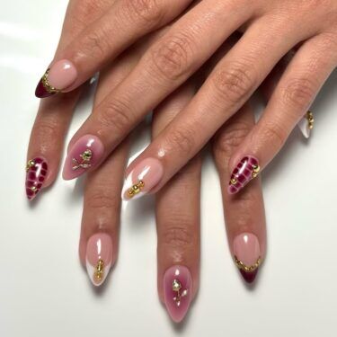 Mixed manicure with prints, nail art, jewelry