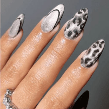 Silver manicure with leopard print
