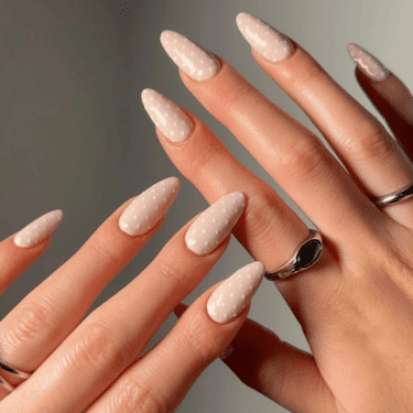 Nude nails with polka dot print