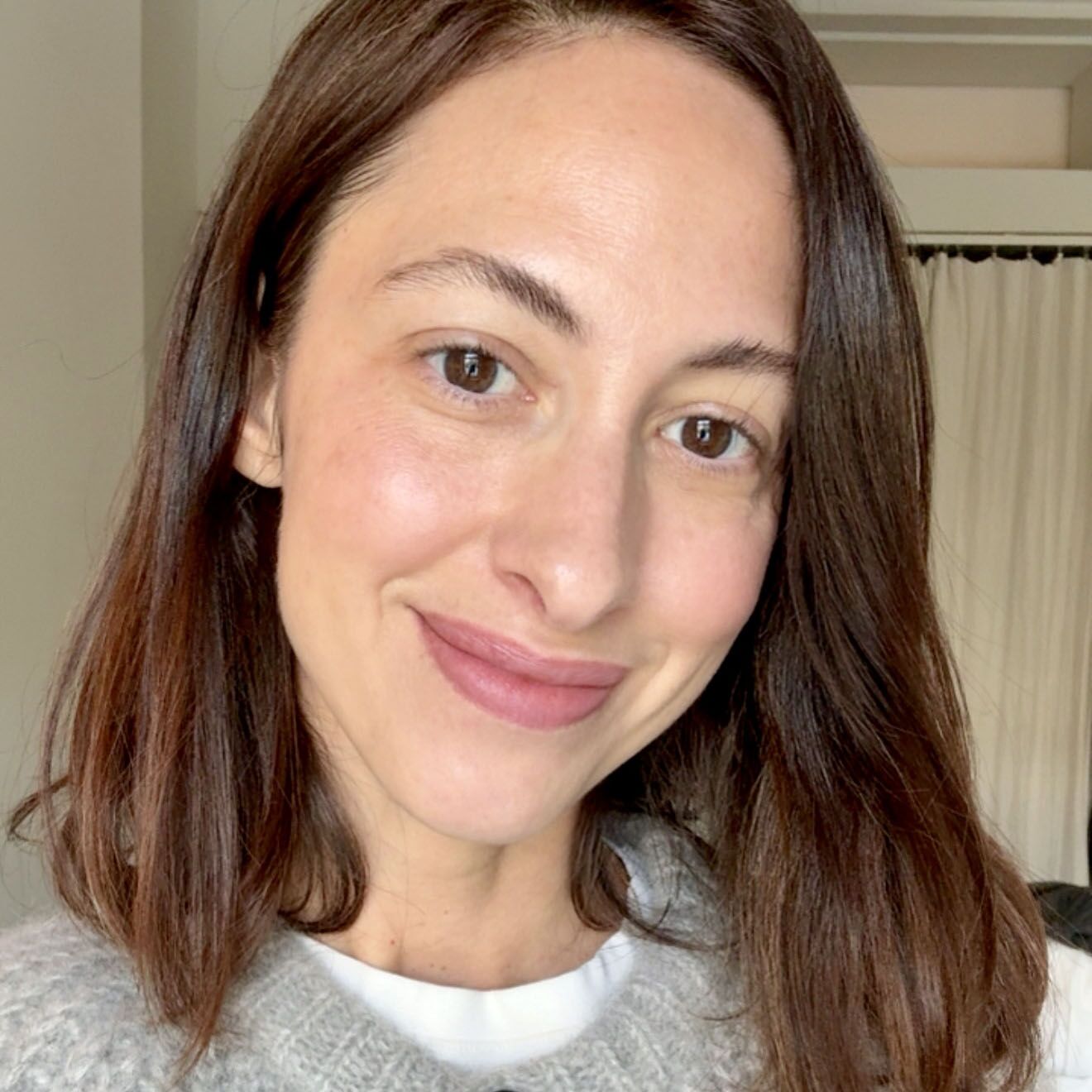 Wearing MERIT Beauty Signature Lip Blush in Archival