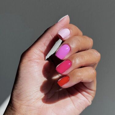 mismatched pink and red nails