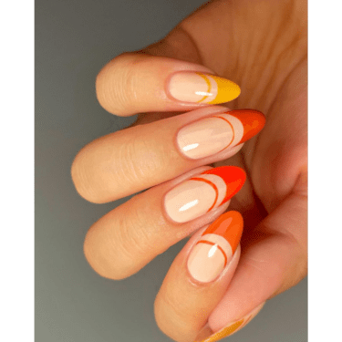 A close up of a woman's manicured nails